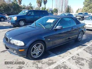 2001 BMW 3 Series 330Ci with VIN WBABS53451JU83279, listed as a IAAI auction lot 41495682 with 238,649 mi miles. Bid and sale history available at carsss.com. Image 2.