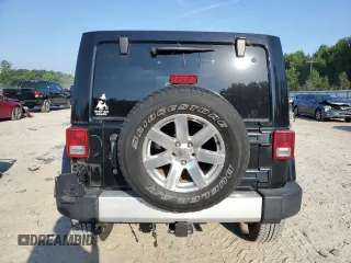 2015 Jeep Wrangler Unlimited Sahara with VIN 1C4HJWEGXFL744852, listed as a Copart auction lot 60246145 with 135,496 mi miles and Salvage title. Bid and sale history available at DreamBid. Image 6.