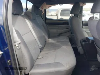 2015 Toyota Tacoma with VIN 3TMMU4FN0FM077148, listed as a IAAI auction lot 41274934 with 112,617 mi miles and . Bid and sale history available at DreamBid. Image 8.