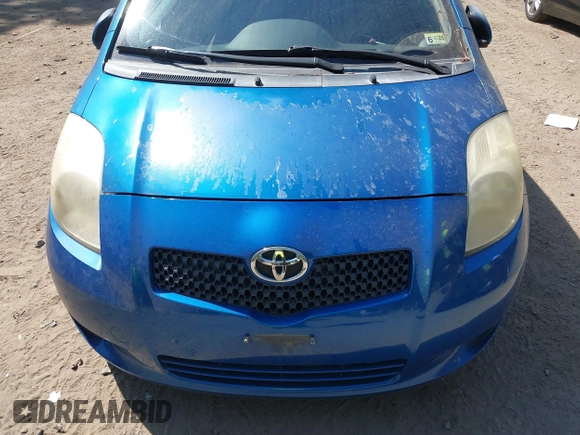 2007 Toyota Yaris z VIN JTDJT923575094820, wystawiony jako IAAI lot #42297736 z przebiegiem 201 052 mil mil oraz . Historia ofert i sprzedaży dostępna na DreamBid. Obrazek 13.