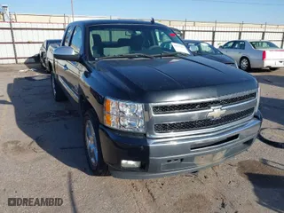 2011 Chevrolet Silverado 1500 LT with VIN 1GCRCSE00BZ327726, listed as a IAAI auction lot 41713327 with 228,435 mi miles. Bid and sale history available at carsss.com. Image 1.