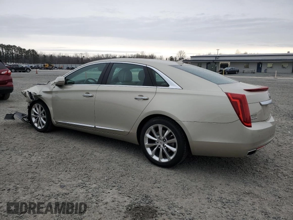 2014 Cadillac XTS Premium with VIN 2G61P5S32E9195930, listed as a Copart auction lot 48320165 with 31,026 mi miles and Salvage Title. Bid and sale history available at DreamBid. Image 2.