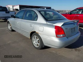 2003 Hyundai Elantra GLS z VIN KMHDN45D63U553542, wystawiony jako IAAI lot #42032294 z przebiegiem 164 210 mil mil oraz . Historia ofert i sprzedaży dostępna na DreamBid. Obrazek 3.
