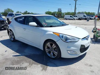 2013 Hyundai Veloster w/Gray Int с VIN KMHTC6ADXDU119323, выставлен на аукционе IAAI как лот 41803517 с пробегом 100 709 миль миль и . История ставок и продаж доступна на DreamBid. Изображение 1.