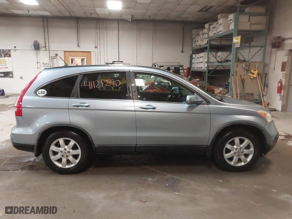 2009 Honda CR-V EX-L with VIN 5J6RE48739L037292, listed as a IAAI auction lot 41121290 with 150,597 mi miles. Bid and sale history available at carsss.com. Image 13.