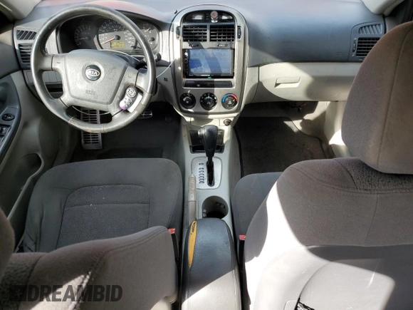 2005 Kia Spectra with VIN KNAFE162255129620, listed as a Copart auction lot 86822464 with 249,516 mi miles and Salvage Title. Bid and sale history available at carsss.com. Image 8.