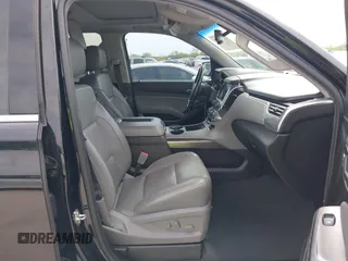 2019 Chevrolet Tahoe LT z VIN 1GNSCBKC0KR275635, wystawiony jako IAAI lot #42071241 z przebiegiem 158 621 mil mil oraz . Historia ofert i sprzedaży dostępna na DreamBid. Obrazek 5.