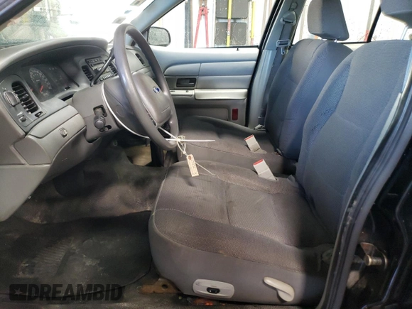 2004 Ford Police Interceptor Base w/3.27 Axle with VIN 2FAFP71WX4X160918, listed as a Copart auction lot 48487095 with 166,883 mi miles and Salvage title. Bid and sale history available at DreamBid. Image 7.