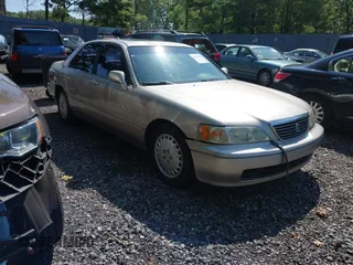 1997 Acura RL Premium with VIN JH4KA9650VC010867, listed as a IAAI auction lot 42822146 with 311,967 mi miles and . Bid and sale history available at DreamBid. Image 1.