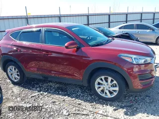 2019 Hyundai Tucson SE with VIN KM8J2CA41KU926156, listed as a IAAI auction lot 41888461 with 91,094 mi miles. Bid and sale history available at carsss.com. Image 13.
