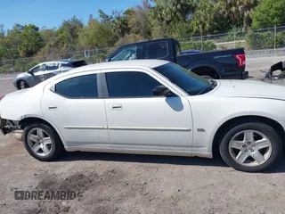 2006 Dodge Charger with VIN 2B3KA43G76H516139, listed as a IAAI auction lot 41875647 with 150,223 mi miles. Bid and sale history available at carsss.com. Image 13.