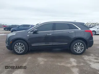 2017 Cadillac XT5 Luxury AWD z VIN 1GYKNDRS9HZ184992, wystawiony jako IAAI lot #41958484 z przebiegiem 124 941 mil mil oraz . Historia ofert i sprzedaży dostępna na DreamBid. Obrazek 14.