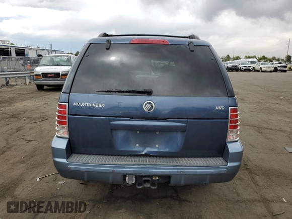 2002 Mercury Mountaineer z VIN 4M2ZU86E62ZJ06894, wystawiony jako Copart lot #56680624 z przebiegiem 200 718 mil mil oraz Nie do naprawy. Historia ofert i sprzedaży dostępna na DreamBid. Obrazek 6.