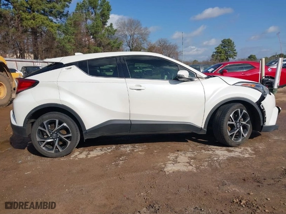 2019 Toyota C-HR XLE with VIN JTNKHMBX2K1041838, listed as a IAAI auction lot 41511513 with 107,145 mi miles. Bid and sale history available at carsss.com. Image 14.