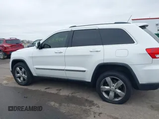 2013 Jeep Grand Cherokee Overland with VIN 1C4RJECG3DC620873, listed as a IAAI auction lot 40909601 with 195,374 mi miles. Bid and sale history available at carsss.com. Image 14.