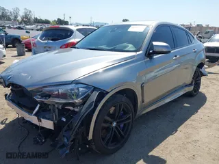 2019 BMW X6 M with VIN 5YMKW8C5XK0Y74895, listed as a IAAI auction lot 41847396 with NaN miles. Bid and sale history available at carsss.com. Image 18.