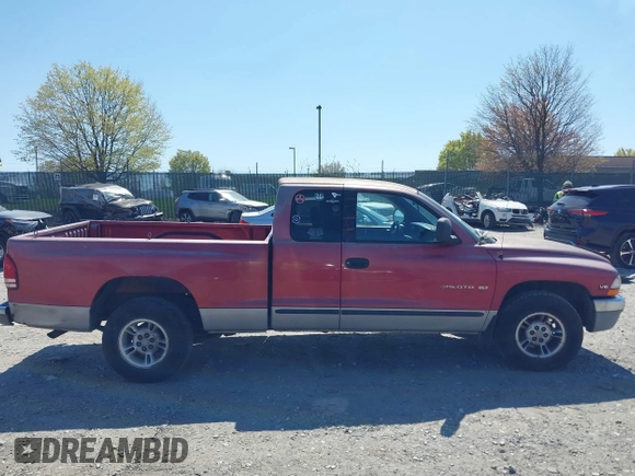1999 Dodge Dakota SLT z VIN 1B7GL22X2XS222162, wystawiony jako IAAI lot #42038943 z przebiegiem 222 883 mil mil oraz . Historia ofert i sprzedaży dostępna na DreamBid. Obrazek 12.