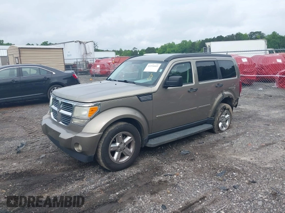 2007 Dodge Nitro SLT z VIN 1D8GT58K07W735904, wystawiony jako IAAI lot #42216665 z przebiegiem 168 000 mil mil oraz . Historia ofert i sprzedaży dostępna na DreamBid. Obrazek 2.