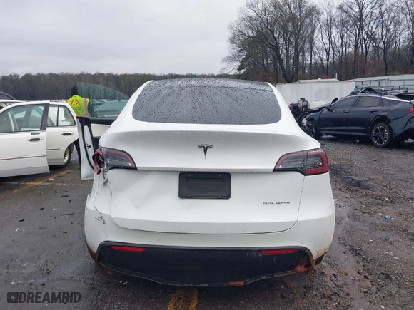 2020 Tesla Model Y Long Range with VIN 5YJYGDEEXLF020059, listed as a IAAI auction lot 41374959 with NaN miles. Bid and sale history available at carsss.com. Image 16.