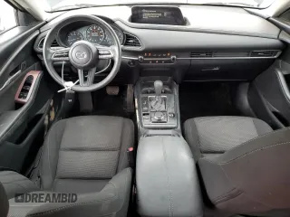2021 Mazda CX-30 S with VIN 3MVDMAAL5MM303863, listed as a Copart auction lot 54946935 with 71,968 mi miles and Salvage title. Bid and sale history available at DreamBid. Image 8.
