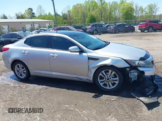 2013 Kia Optima EX with VIN 5XXGN4A73DG108068, listed as a IAAI auction lot 42059774 with 210,179 mi miles and . Bid and sale history available at carsss.com. Image 6.