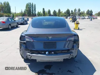 2023 Tesla Model 3 with VIN 5YJ3E1EAXPF405588, listed as a IAAI auction lot 42348952 with 30,788 mi miles and . Bid and sale history available at DreamBid. Image 17.