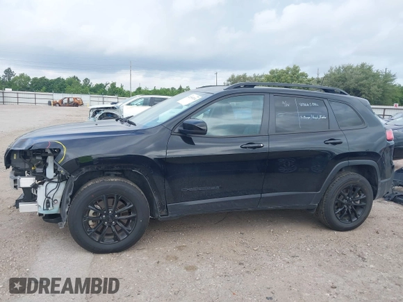 2023 Jeep Cherokee Altitude Lux with VIN 1C4PJMMB9PD114936, listed as a IAAI auction lot 42159214 with 59,525 mi miles. Bid and sale history available at carsss.com. Image 15.