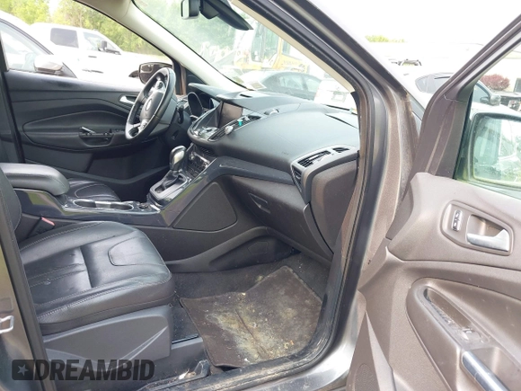 2013 Ford Escape Titanium with VIN 1FMCU9J96DUD74870, listed as a IAAI auction lot 42415332 with 178,651 mi miles and . Bid and sale history available at DreamBid. Image 5.