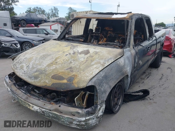 2000 GMC Sierra 1500 SLE z VIN 2GTEC19T7Y1145021, wystawiony jako IAAI lot #40013126 z przebiegiem Nie podano mil oraz . Historia ofert i sprzedaży dostępna na DreamBid. Obrazek 6.