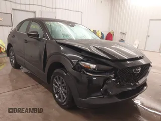 2021 Mazda CX-30 S with VIN 3MVDMBAL2MM265207, listed as a IAAI auction lot 41566325 with 62,587 mi miles and . Bid and sale history available at carsss.com. Image 1.