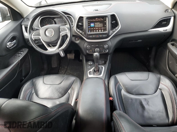 2014 Jeep Cherokee Trailhawk with VIN 1C4PJMBS4EW160341, listed as a Copart auction lot 60761475 with 135,087 mi miles and Salvage title. Bid and sale history available at DreamBid. Image 8.