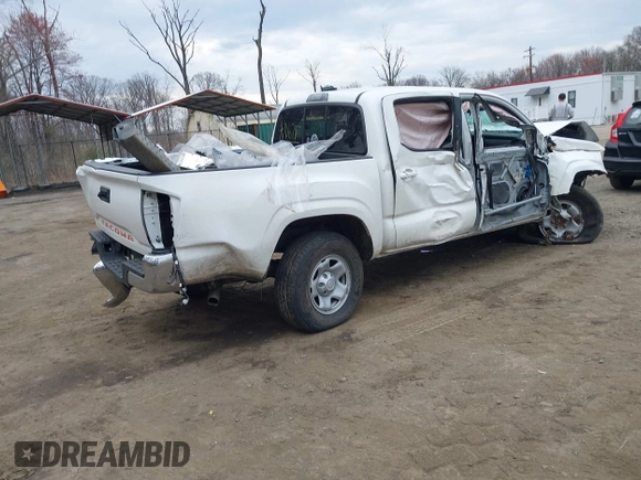2022 Toyota Tacoma SR with VIN 3TYAX5GN3NT062077, listed as a IAAI auction lot 41886531 with 58,687 mi miles and . Bid and sale history available at DreamBid. Image 4.