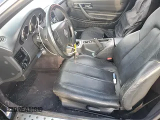 1999 Mercedes-Benz SLK-Class with VIN WDBKK47F1XF124854, listed as a Copart auction lot 73160604 with 55,730 mi miles and Salvage Title. Bid and sale history available at carsss.com. Image 7.