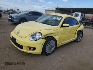 2014 Volkswagen Beetle with VIN 3VWHX7AT6EM632938, listed as a Copart auction lot 58599124 with 89,546 mi miles and Salvage Title. Bid and sale history available at DreamBid. Image 1.