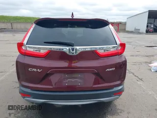 2019 Honda CR-V EX with VIN 7FARW2H56KE053022, listed as a IAAI auction lot 41848570 with 128,676 mi miles. Bid and sale history available at carsss.com. Image 17.