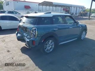 2022 MINI Countryman Cooper S with VIN WMZ53BR02N3N67991, listed as a IAAI auction lot 42181491 with 54,701 mi miles and . Bid and sale history available at DreamBid. Image 4.