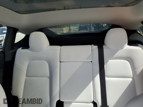 2024 Tesla Model Y Long Range with VIN 7SAYGDEE2RF090540, listed as a Copart auction lot 56684505 with 18,261 mi miles and Salvage title. Bid and sale history available at DreamBid. Image 10.