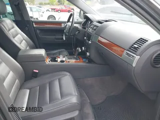 2005 Volkswagen Touareg 3.2L V6 with VIN WVGZG77L55D071024, listed as a IAAI auction lot 42111205 with 204,417 mi miles and . Bid and sale history available at DreamBid. Image 5.