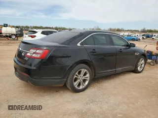 2016 Ford Taurus SEL with VIN 1FAHP2E84GG141220, listed as a Copart auction lot 48048514 with 124,631 mi miles and Salvage Title. Bid and sale history available at DreamBid. Image 3.