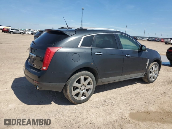 2012 Cadillac SRX Premium Collection с VIN 3GYFNCE32CS505884, выставлен на аукционе Copart как лот 55402575 с пробегом 160 668 миль миль и Списание • Salvage title. История ставок и продаж доступна на DreamBid. Изображение 3.