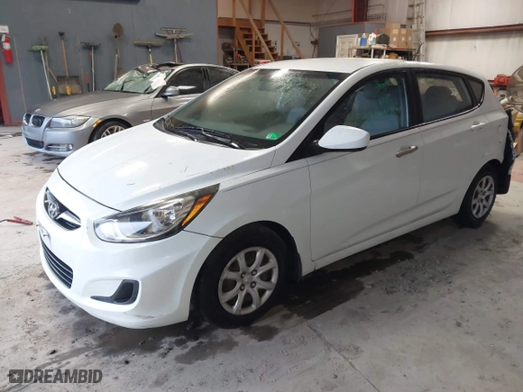 2013 Hyundai Accent GL with VIN KMHCT5AE6DU122559, listed as a IAAI auction lot 41800714 with 129,582 mi miles. Bid and sale history available at carsss.com. Image 2.