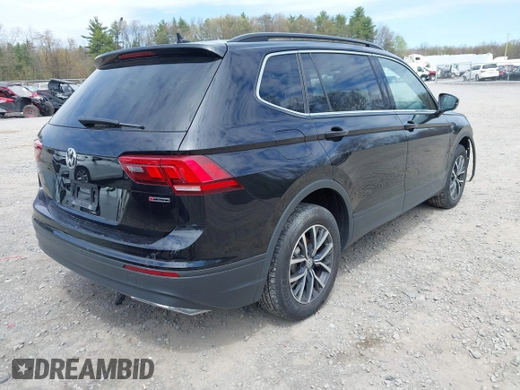 2019 Volkswagen Tiguan SE with VIN 3VV2B7AX7KM174382, listed as a IAAI auction lot 42147584 with 64,460 mi miles and . Bid and sale history available at DreamBid. Image 4.