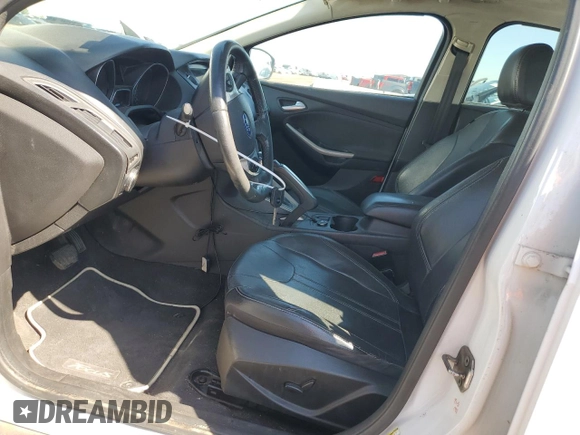 2012 Ford Focus SEL with VIN 1FAHP3H23CL403646, listed as a Copart auction lot 56329195 with 138,030 mi miles and Clean Title. Bid and sale history available at DreamBid. Image 7.