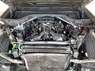 2018 BMW X5 M z VIN 5YMKT6C56J0Y83685, wystawiony jako Copart lot #55342035 z przebiegiem 56 136 mil mil oraz Szkoda całkowita • Salvage title. Historia ofert i sprzedaży dostępna na DreamBid. Obrazek 11.
