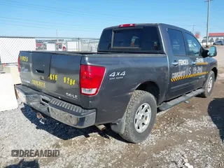 2005 Nissan Titan SE with VIN 1N6BA07B15N569959, listed as a IAAI auction lot 41389671 with 188,335 mi miles and . Bid and sale history available at DreamBid. Image 4.