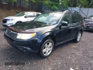 2009 Subaru Forester X with VIN JF2SH63619H738409, listed as a IAAI auction lot 42428672 with 190,636 mi miles and . Bid and sale history available at DreamBid. Image 2.