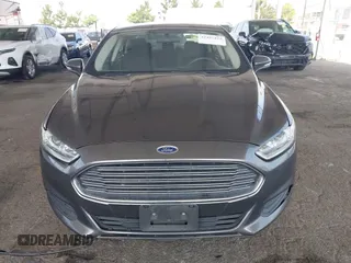 2015 Ford Fusion SE Hybrid with VIN 3FA6P0LU6FR309099, listed as a IAAI auction lot 42497429 with 157,631 mi miles and . Bid and sale history available at DreamBid. Image 12.