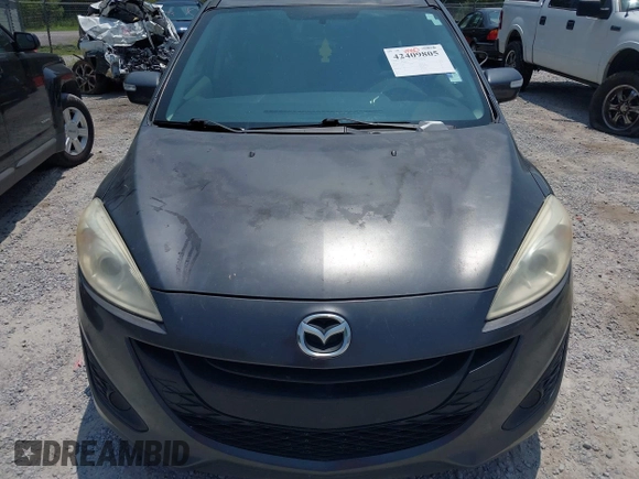 2015 Mazda 5 Sport with VIN JM1CW2BL7F0183114, listed as a IAAI auction lot 42409805 with 174,606 mi miles and . Bid and sale history available at DreamBid. Image 6.