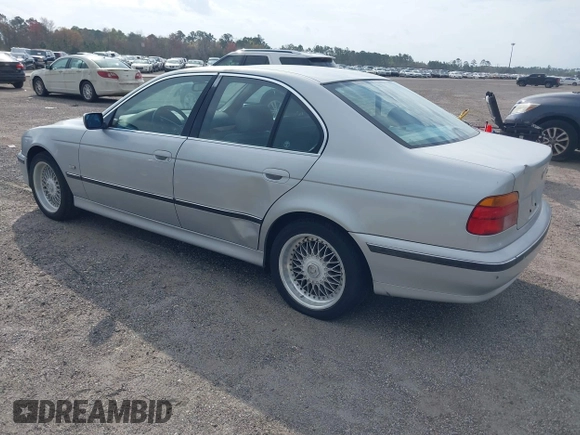2000 BMW 5 Series 528iA with VIN WBADM6344YGU22084, listed as a IAAI auction lot 41734099 with 249,650 mi miles. Bid and sale history available at carsss.com. Image 3.