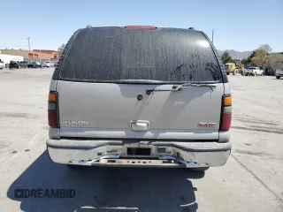 2004 GMC Yukon SLT with VIN 1GKEC13V94J331979, listed as a Copart auction lot 52487075 with 249,779 mi miles and Salvage Title. Bid and sale history available at carsss.com. Image 6.